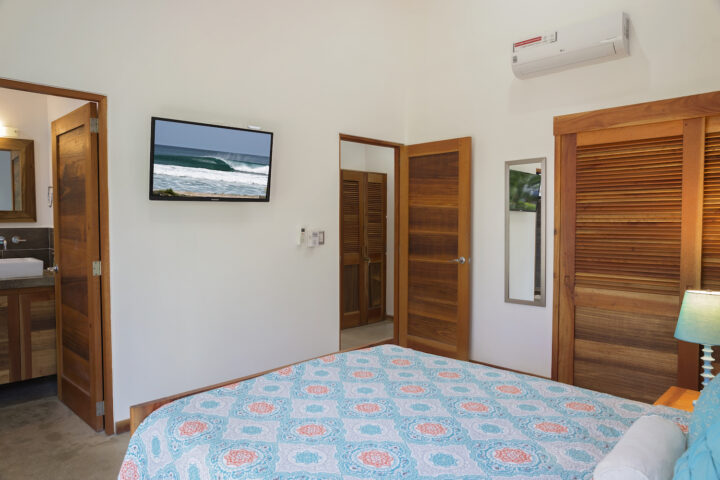 Invest_Nicaragua_Real_Estate_Tola_Eco_Casita_6_Master_Bed_Angle_2_CC_HIGH_RES-720×480-1
